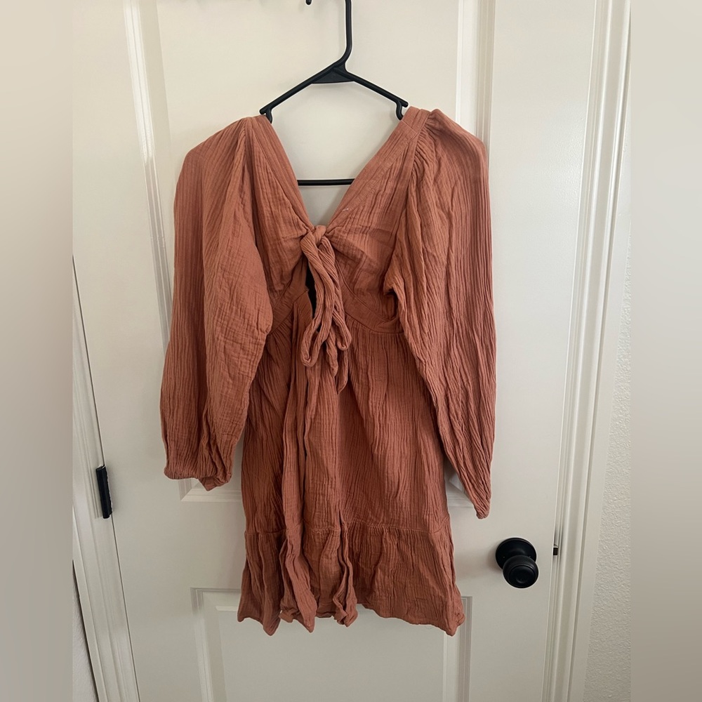 Peach colored long sleeve dress
